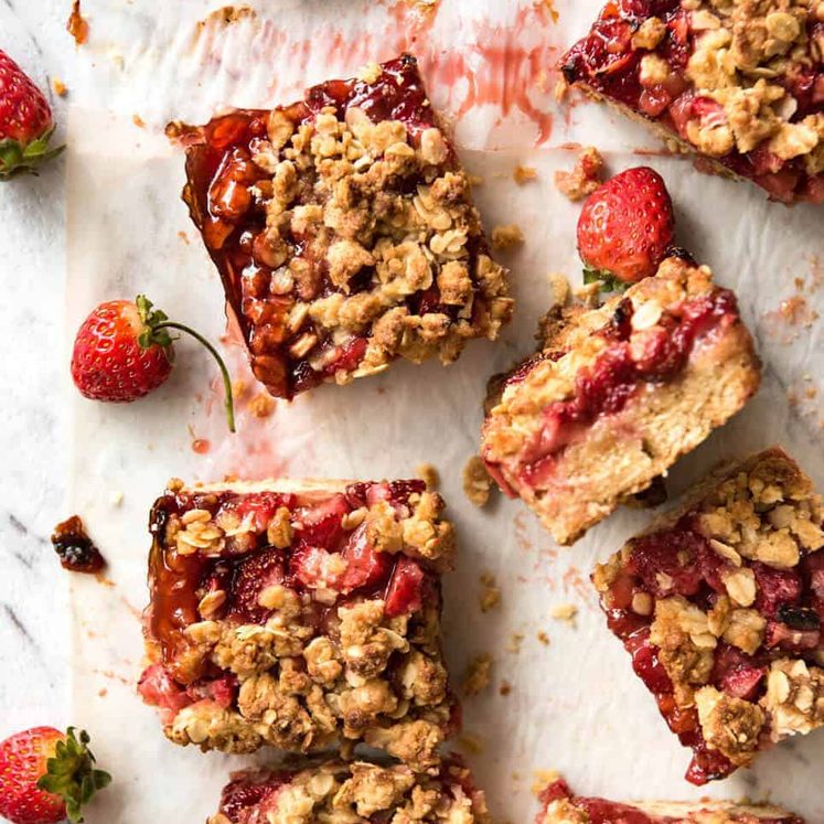 Fresh Strawberry Bars with a buttery biscuit base, topped with jam, fresh strawberries and a crumbly topping. No mixer, quick to make! dev.recipetineats.com