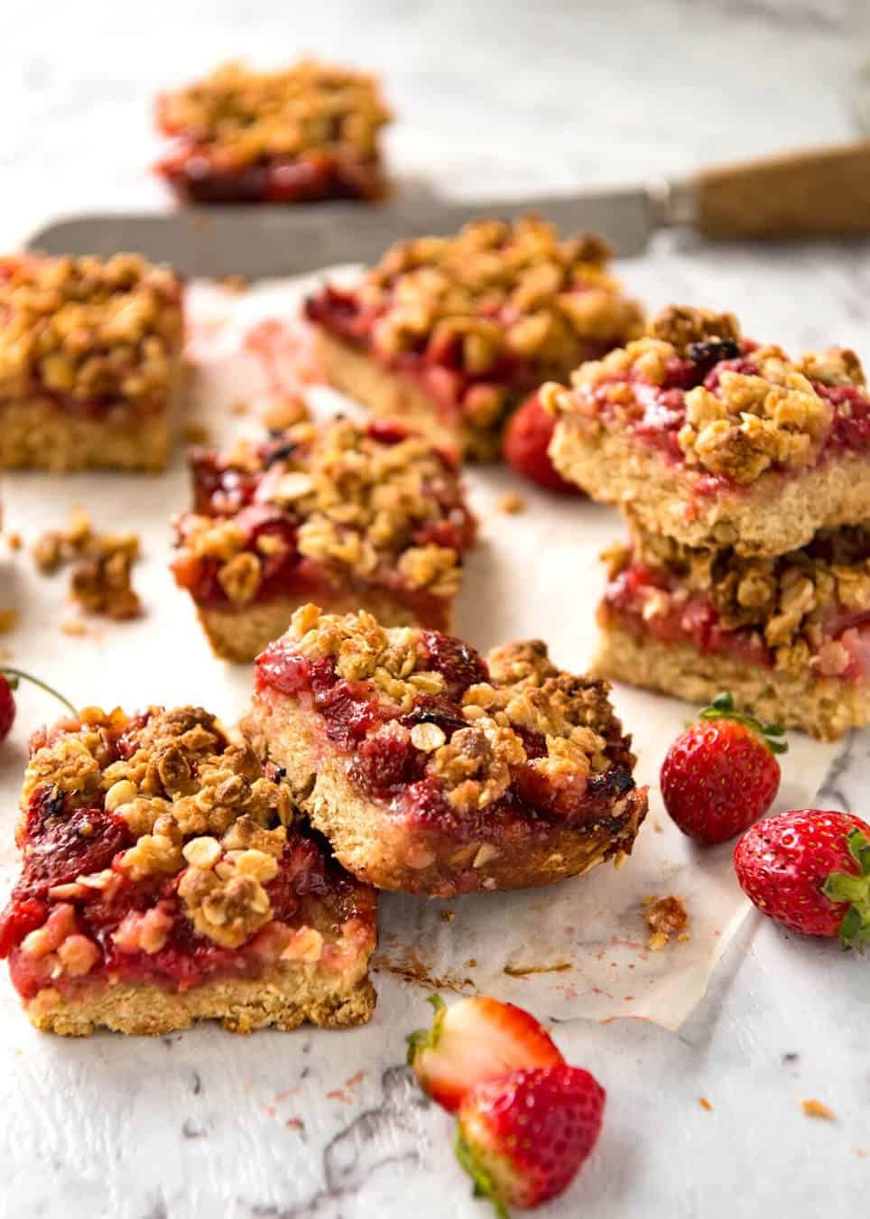 Fresh Strawberry Bars with a buttery biscuit base, topped with jam, fresh strawberries and a crumbly topping. No mixer, quick to make! dev.recipetineats.com