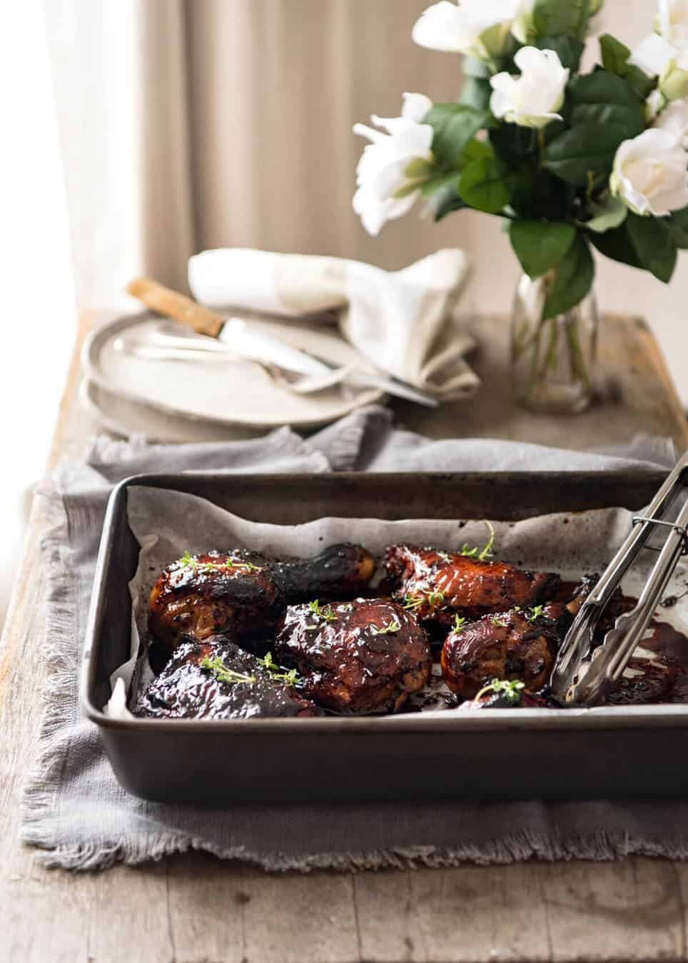 Balsamic vinegar, soy sauce, honey, sugar and garlic is all you need to make this super easy and fast Baked Balsamic Chicken! No marinating required. dev.recipetineats.com
