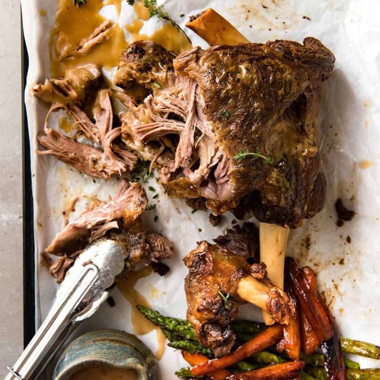 The most succulent and easiest lamb leg ever, this Slow Cooker Roast Lamb Leg takes minutes to prepare. The gravy is incredible! dev.recipetineats.com