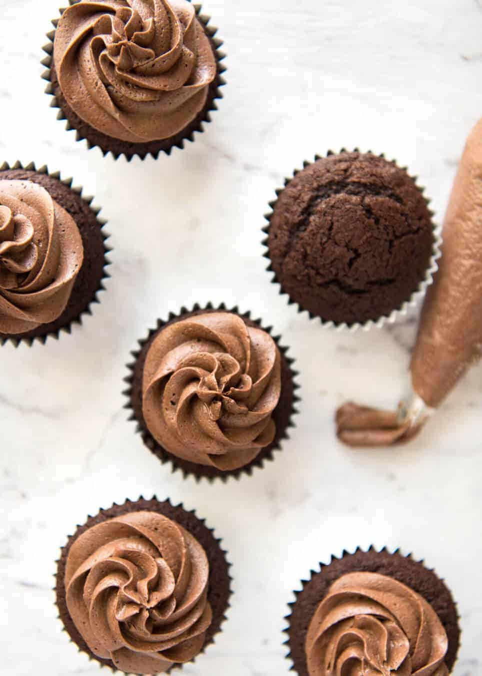 No stand mixer required to make the Best EASY Chocolate Cupcakes. Moist, deeply chocolatey with a tender crumb, these are unbelievably fast & easy. dev.recipetineats.com
