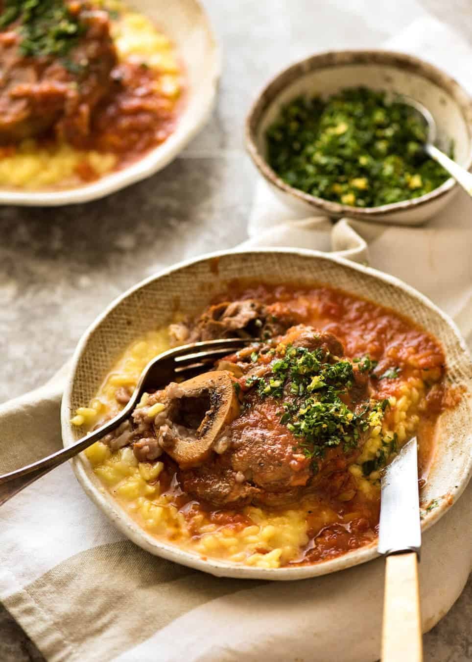 Fork tender veal braised in a rich red sauce, Osso Buco is a meal fit for a king! dev.recipetineats.com