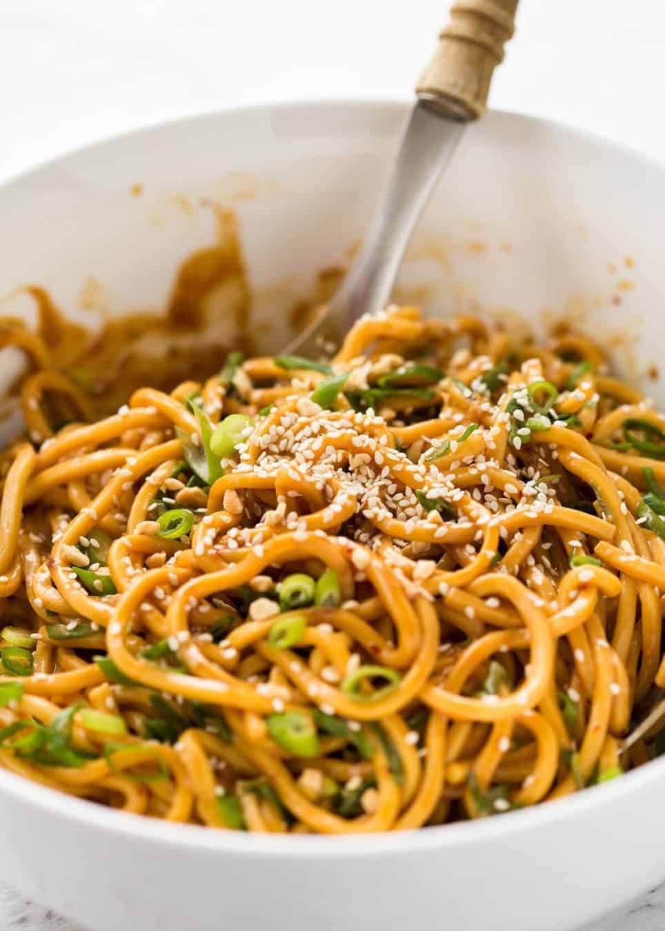 Sesame Noodles - noodles tossed with a wicked Asian Sesame Peanut Dressing. Serve these as Cold Sesame Noodles or warm. dev.recipetineats.com