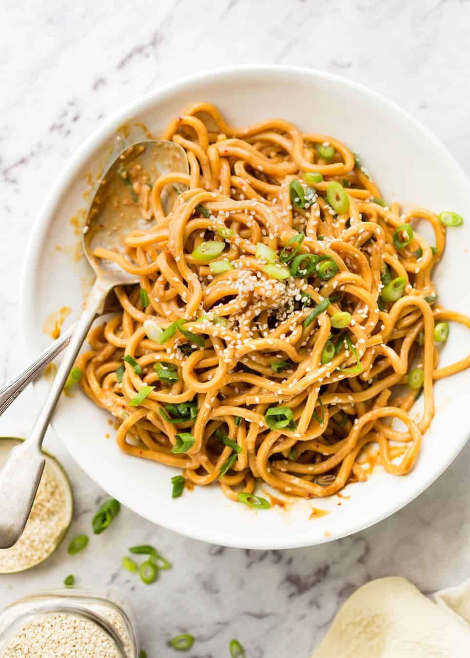 Sesame Noodles - noodles tossed with a wicked Asian Sesame Peanut Dressing. Serve these as Cold Sesame Noodles or warm. dev.recipetineats.com
