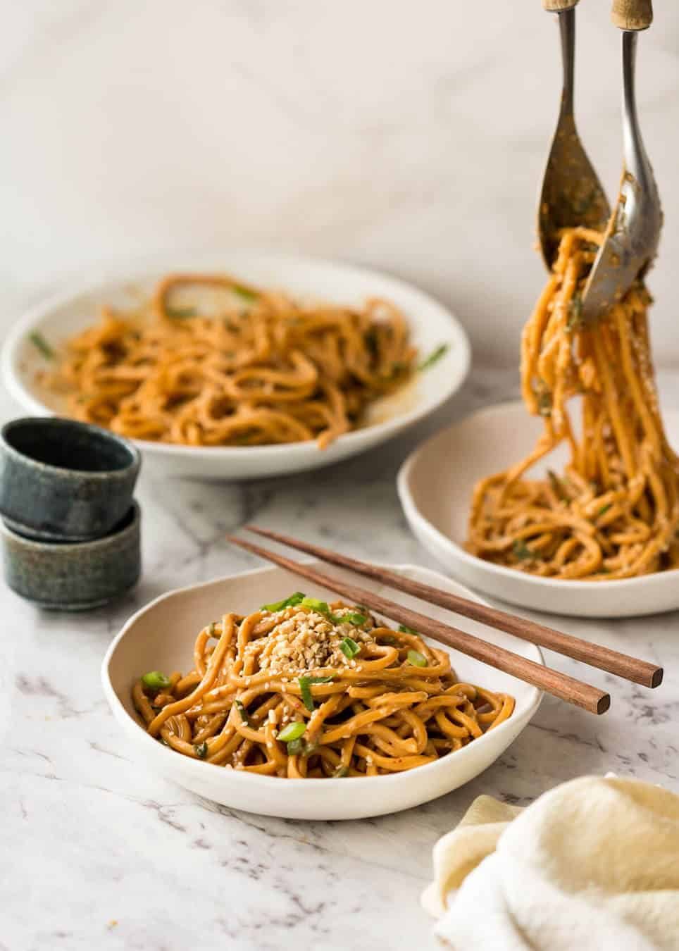 Sesame Noodles - noodles tossed with a wicked Asian Sesame Peanut Dressing. Serve these as Cold Sesame Noodles or warm. dev.recipetineats.com