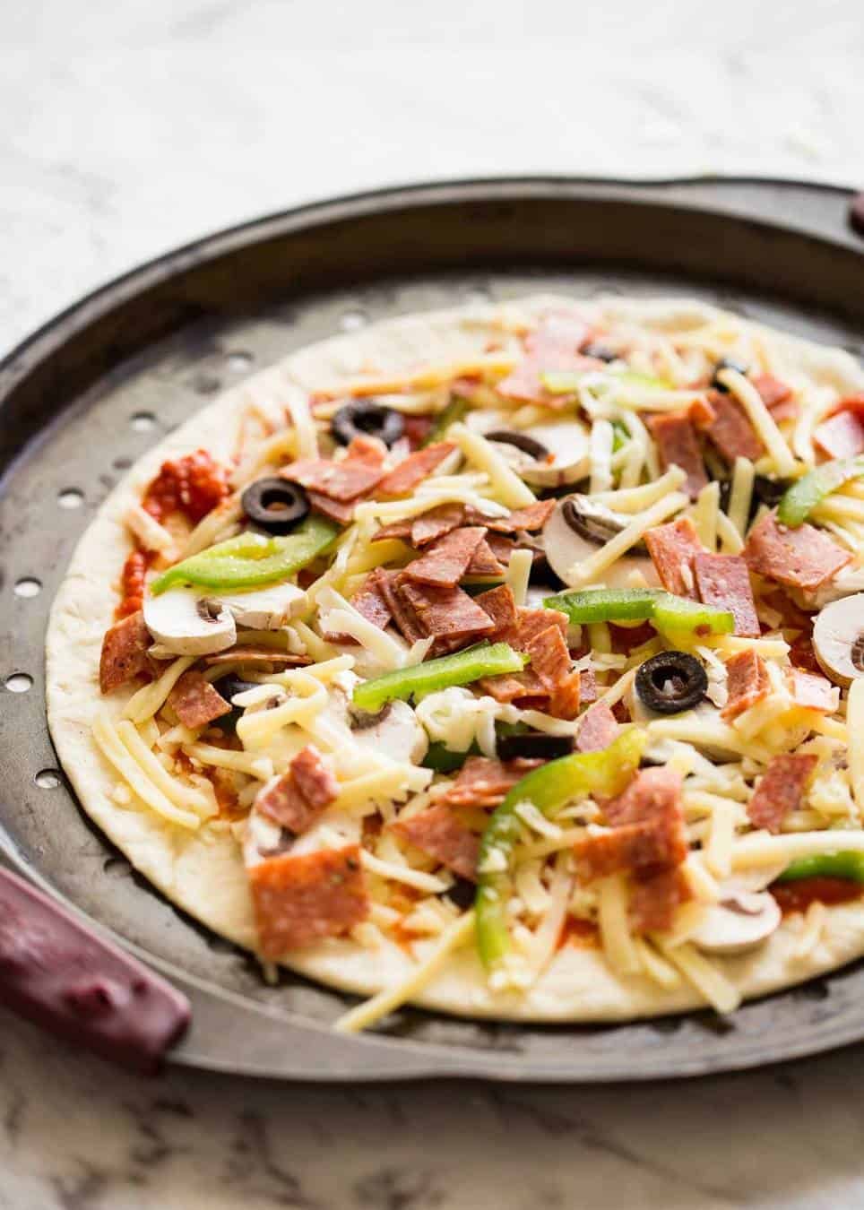 How to bake Crispy Base Pizza using Flatbread dev.recipetineats.com