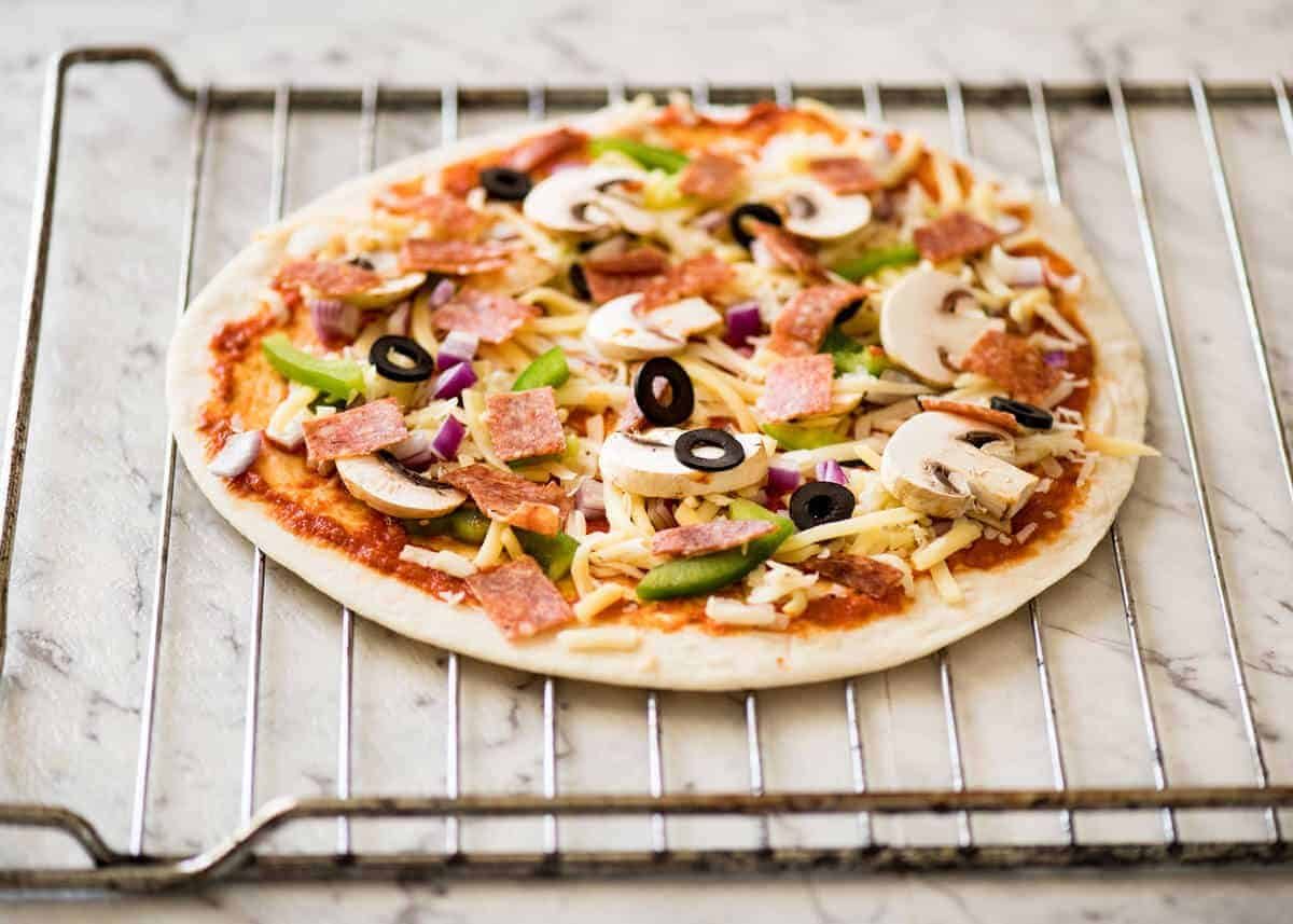 How to bake Crispy Base Pizza using Flatbread dev.recipetineats.com