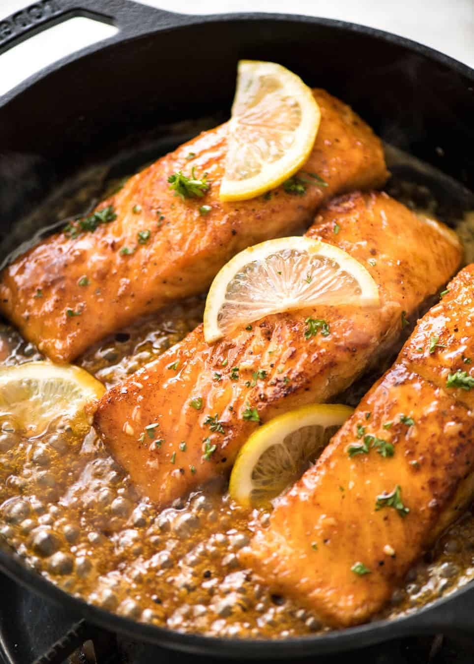 If this Lemon Honey Glazed Salmon takes more than 8 minutes to make, you've overcooked the salmon. That sauce is lip smackingly delicious! dev.recipetineats.com