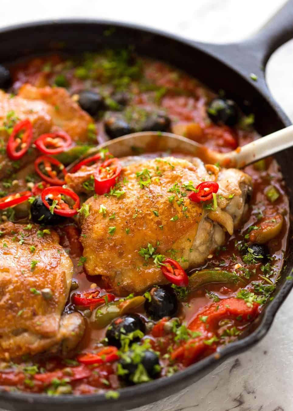 A hearty Italian Chicken Casserole with crispy chicken, capsicum / bell peppers, olives and capers. Sicilian style! dev.recipetineats.com