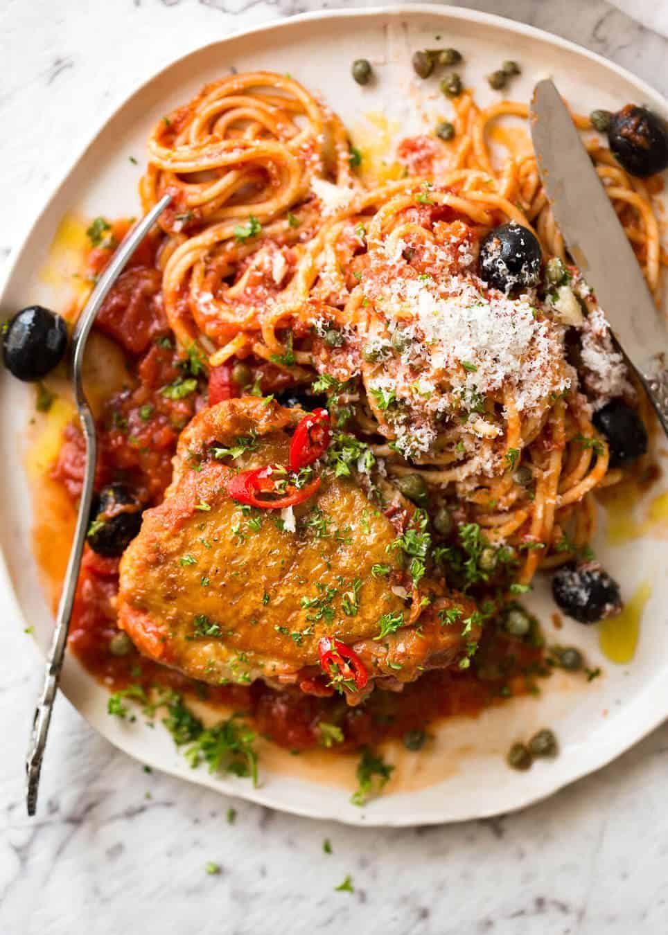 A hearty Italian Chicken Casserole with crispy chicken, capsicum / bell peppers, olives and capers. Sicilian style! dev.recipetineats.com