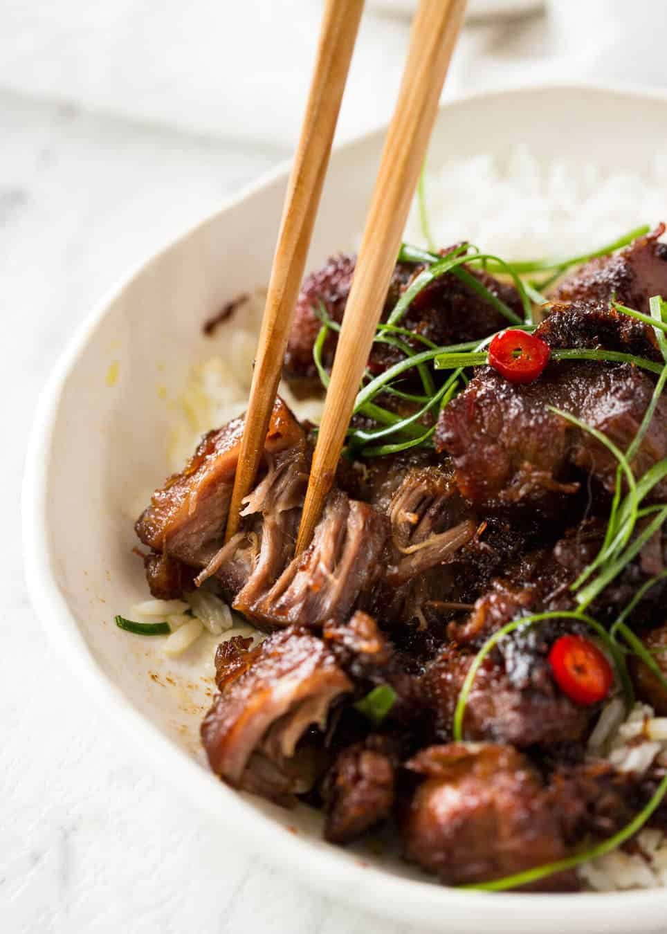 Vietnamese Caramel Pork is a simple, magical recipe - tender pork in a sweet savoury glaze and no hunting down unusual ingredients! dev.recipetineats.com