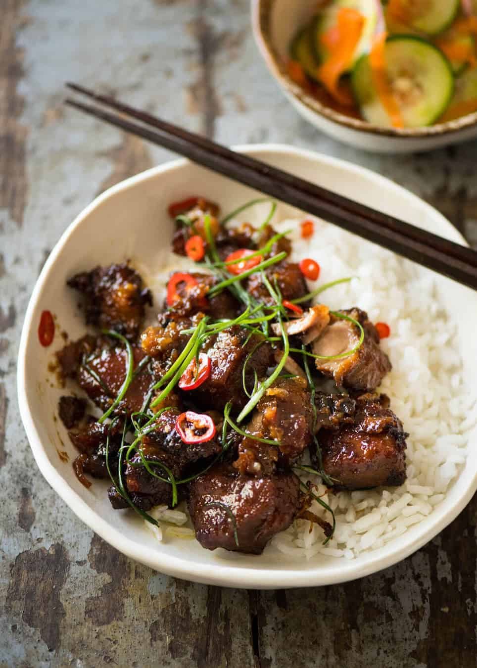 Vietnamese Caramel Pork is a simple, magical recipe - tender pork in a sweet savoury glaze and no hunting down unusual ingredients! dev.recipetineats.com