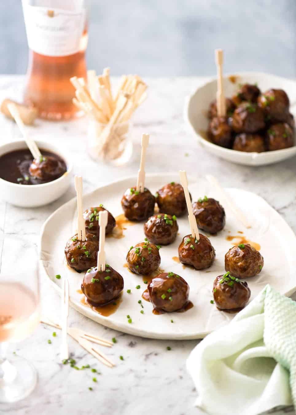 Plump, juicy and soft, these Party Cocktail Meatballs are baked and served with a fabulous Sweet & Sour Dipping Sauce that's super quick to make. Great make ahead for parties! dev.recipetineats.com