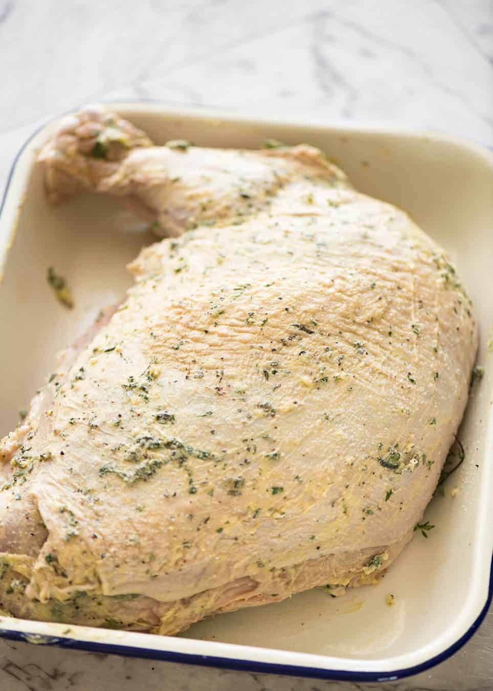 How to make turkey with herb butter under the skin (quick video tutorial provided) dev.recipetineats.com