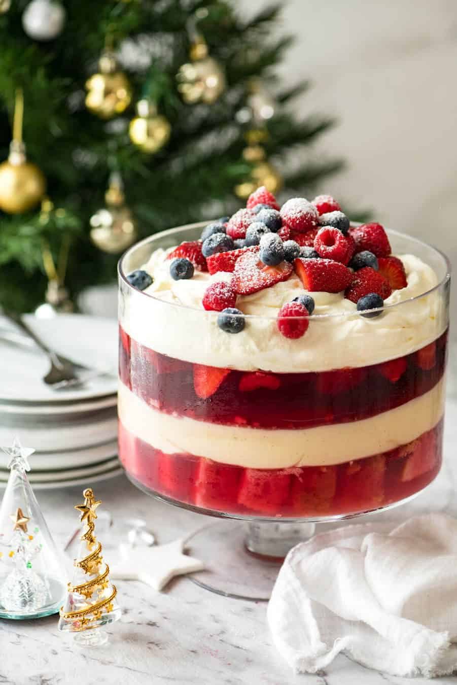 Beautiful, easy Christmas Trifle with Cranberry Juice Jelly, custard, lots of cream and berries! dev.recipetineats.com