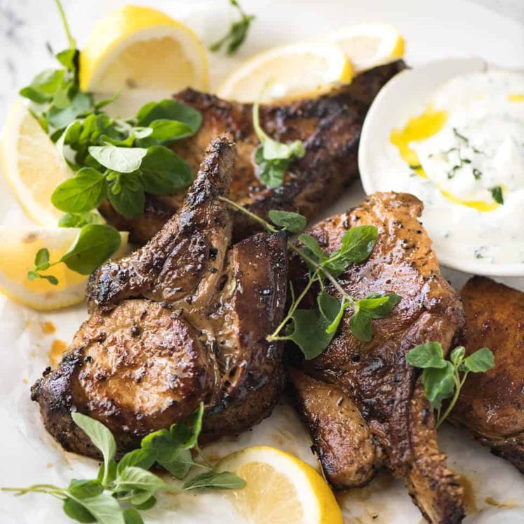 Nothing adds flavour to a pork chop like a good marinade! Lemon Garlic Marinated Pork Chops - dev.recipetineats.com