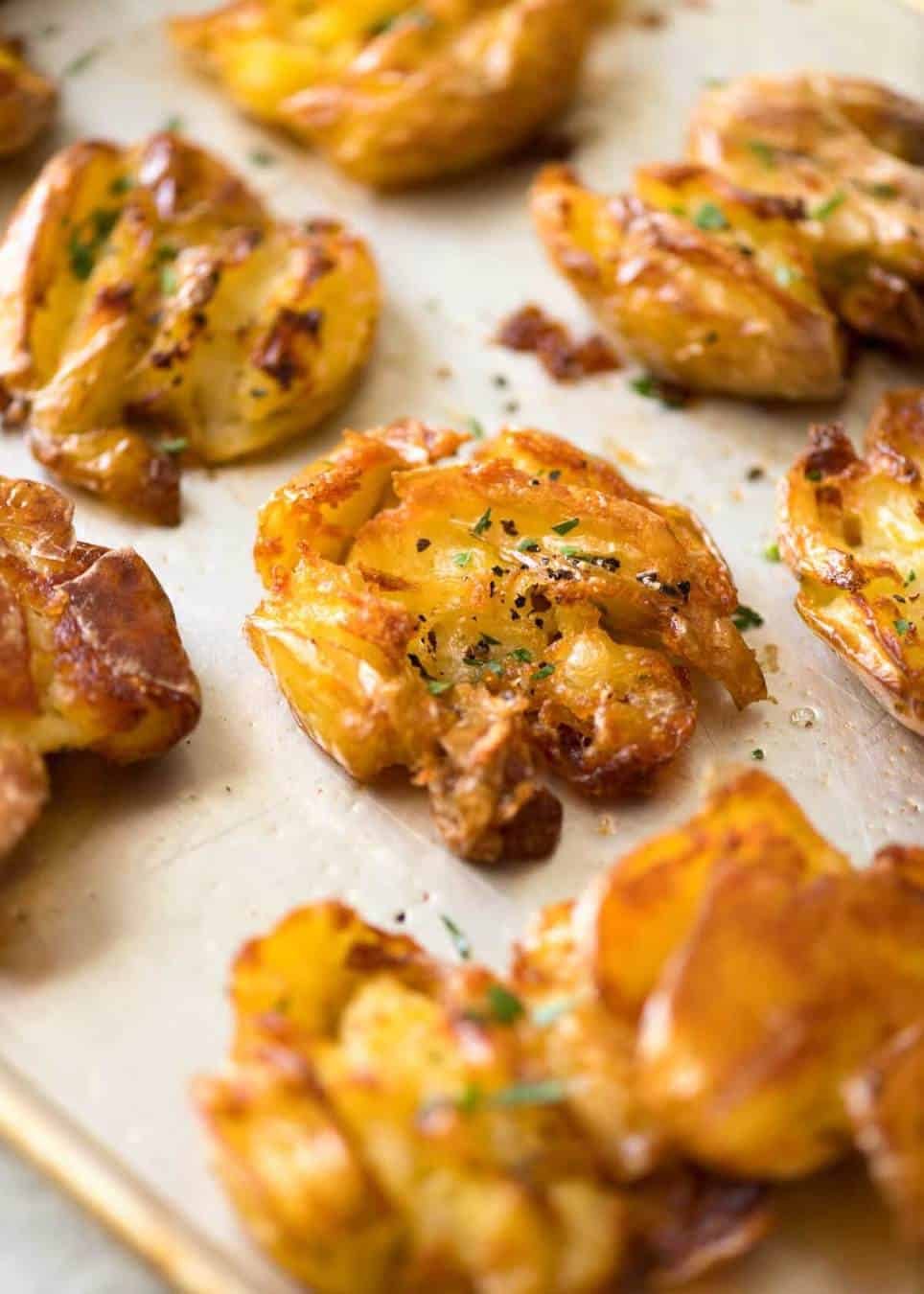 The best, buttery, golden, ultra crispy smashed potatoes you will ever have! dev.recipetineats.com