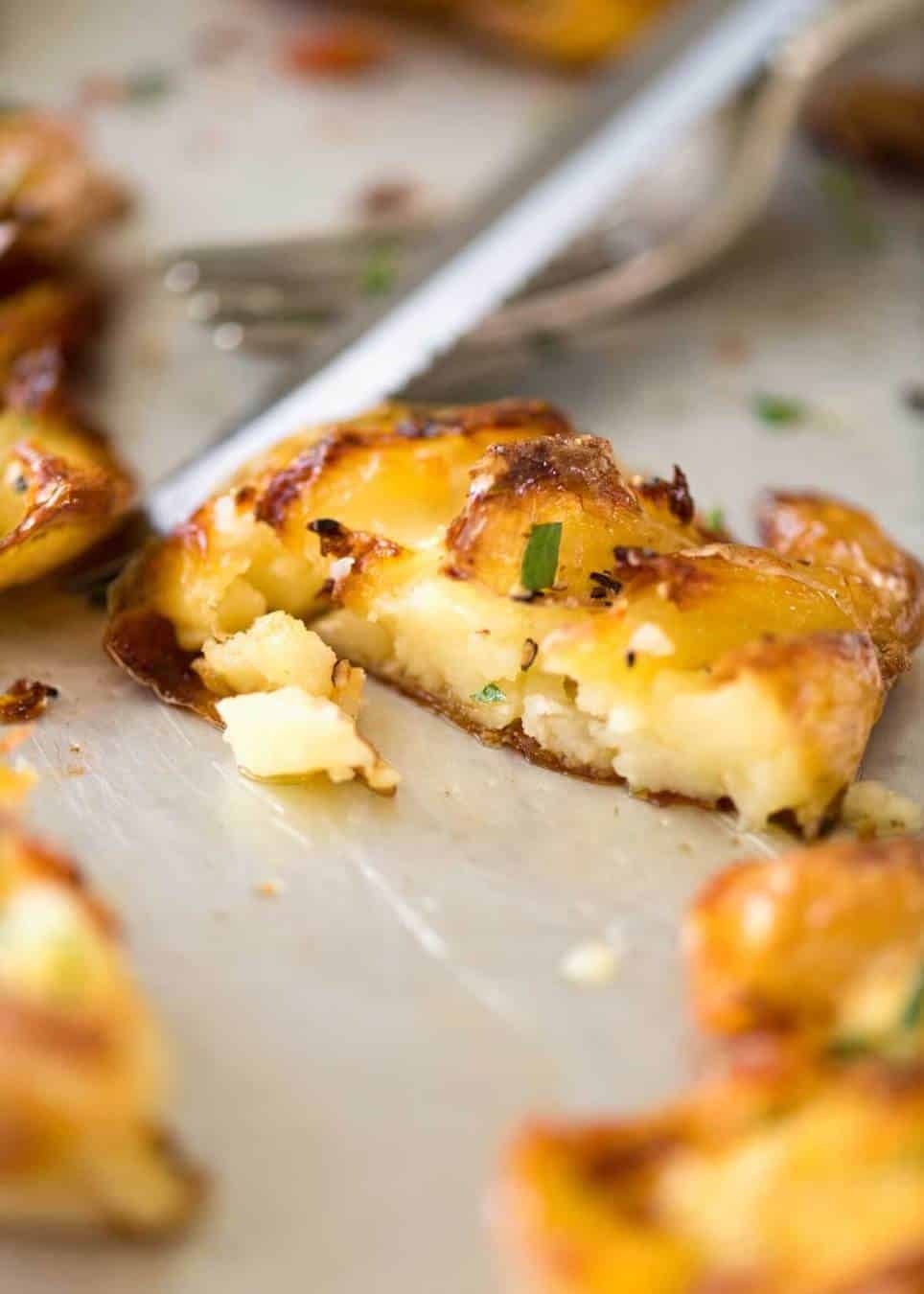 The best, buttery, golden, ultra crispy smashed potatoes you will ever have! dev.recipetineats.com