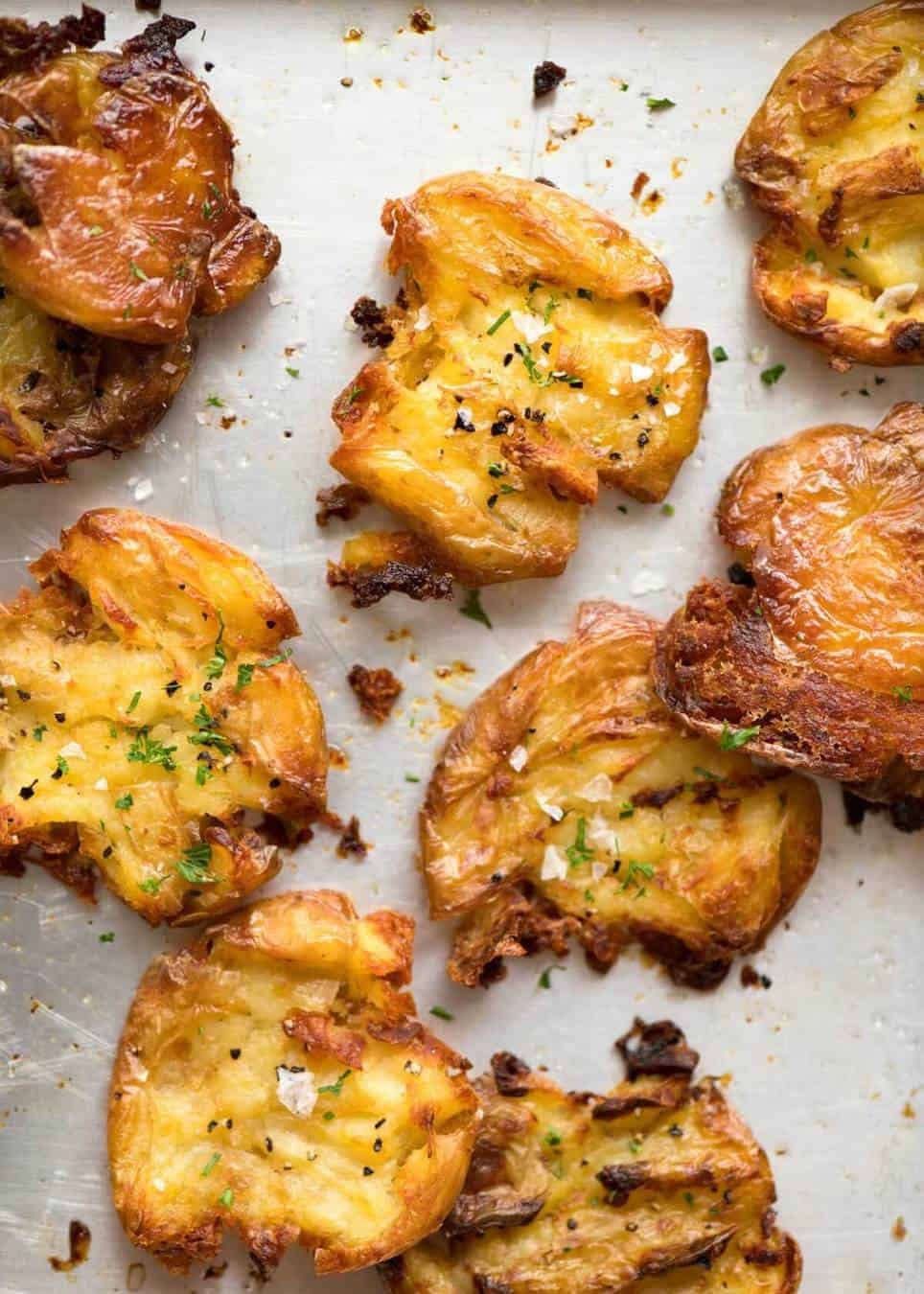 The best, buttery, golden, ultra crispy smashed potatoes you will ever have! dev.recipetineats.com