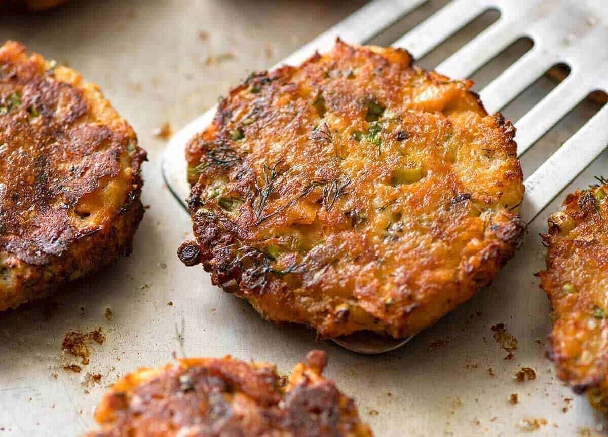 Tender insides studded with flakes of salmon, golden on the outside, these Salmon Patties are baked, not fried. Ultimate transformation of canned salmon - or use fresh! dev.recipetineats.com