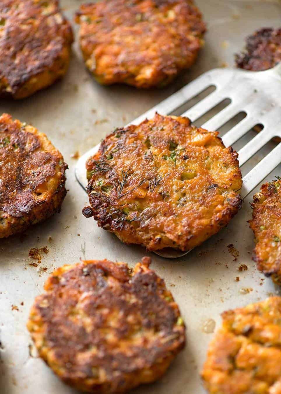 Tender insides studded with flakes of salmon, golden on the outside, these Salmon Patties are baked, not fried. Ultimate transformation of canned salmon - or use fresh! dev.recipetineats.com