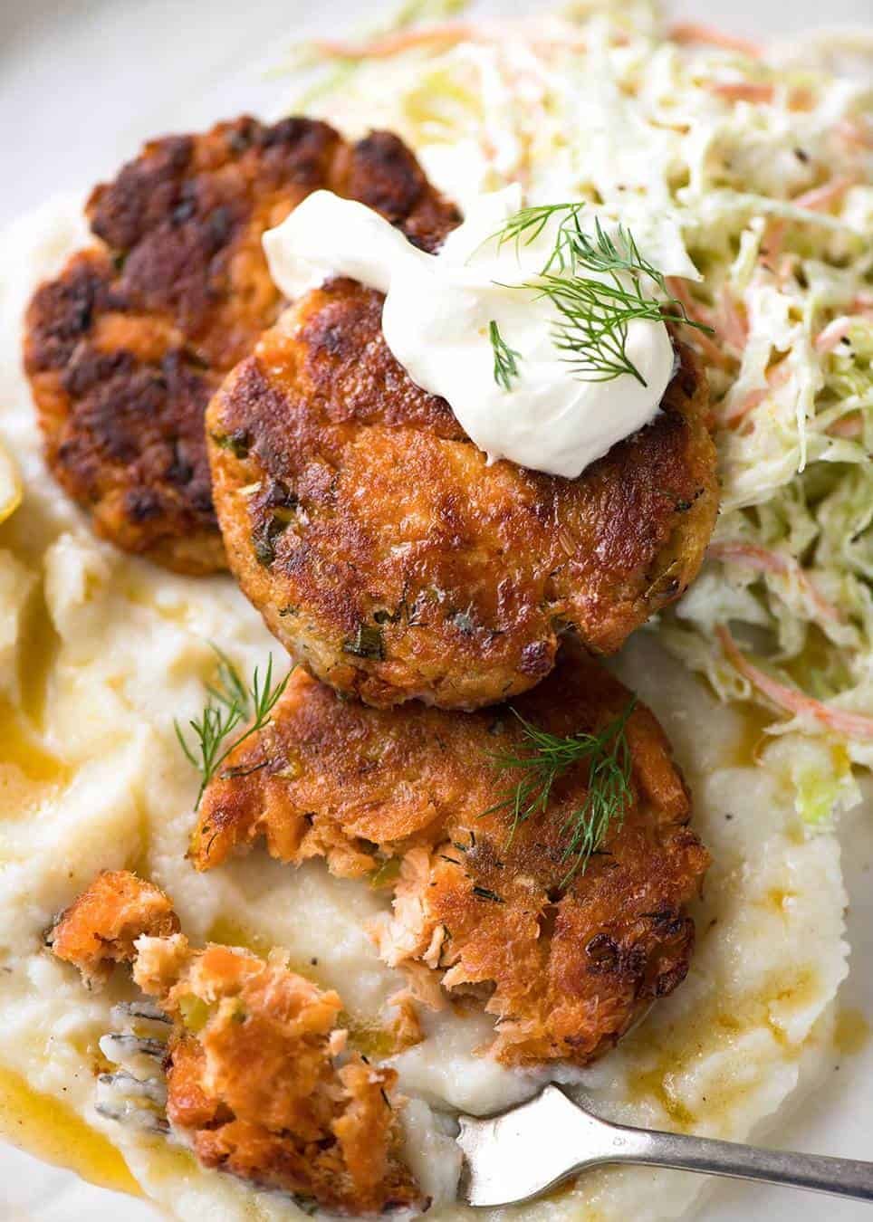 Tender insides studded with flakes of salmon, golden on the outside, these Salmon Patties are baked, not fried. Ultimate transformation of canned salmon - or use fresh! dev.recipetineats.com
