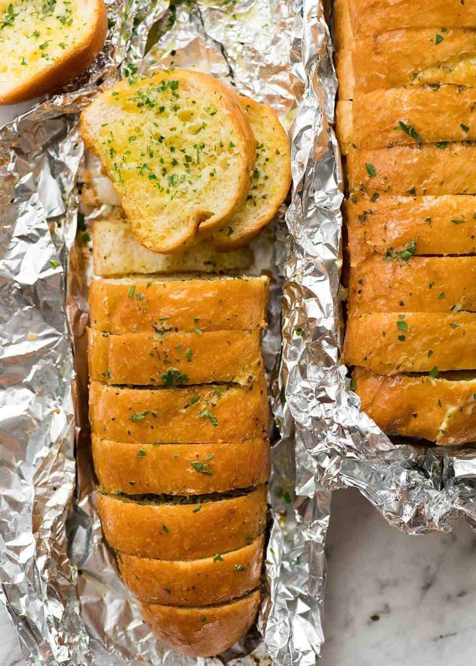 Better than Pizza Hut! For a truly religious Garlic Bread experience, skip the artisan bread and use a basic French stick. And no skimping on butter! dev.recipetineats.com