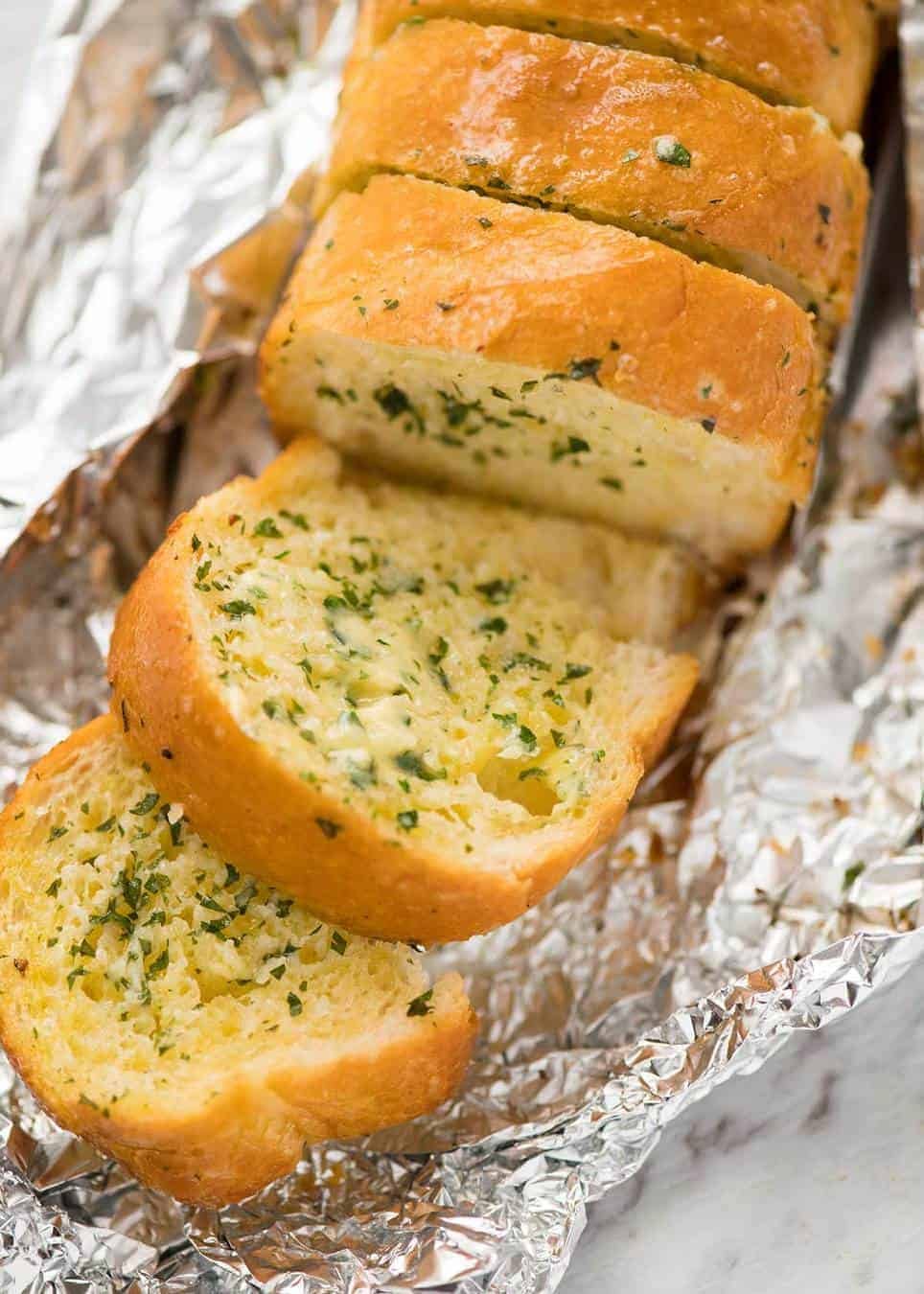 Better than Pizza Hut! For a truly religious Garlic Bread experience, skip the artisan bread and use a basic French stick. And no skimping on butter! dev.recipetineats.com