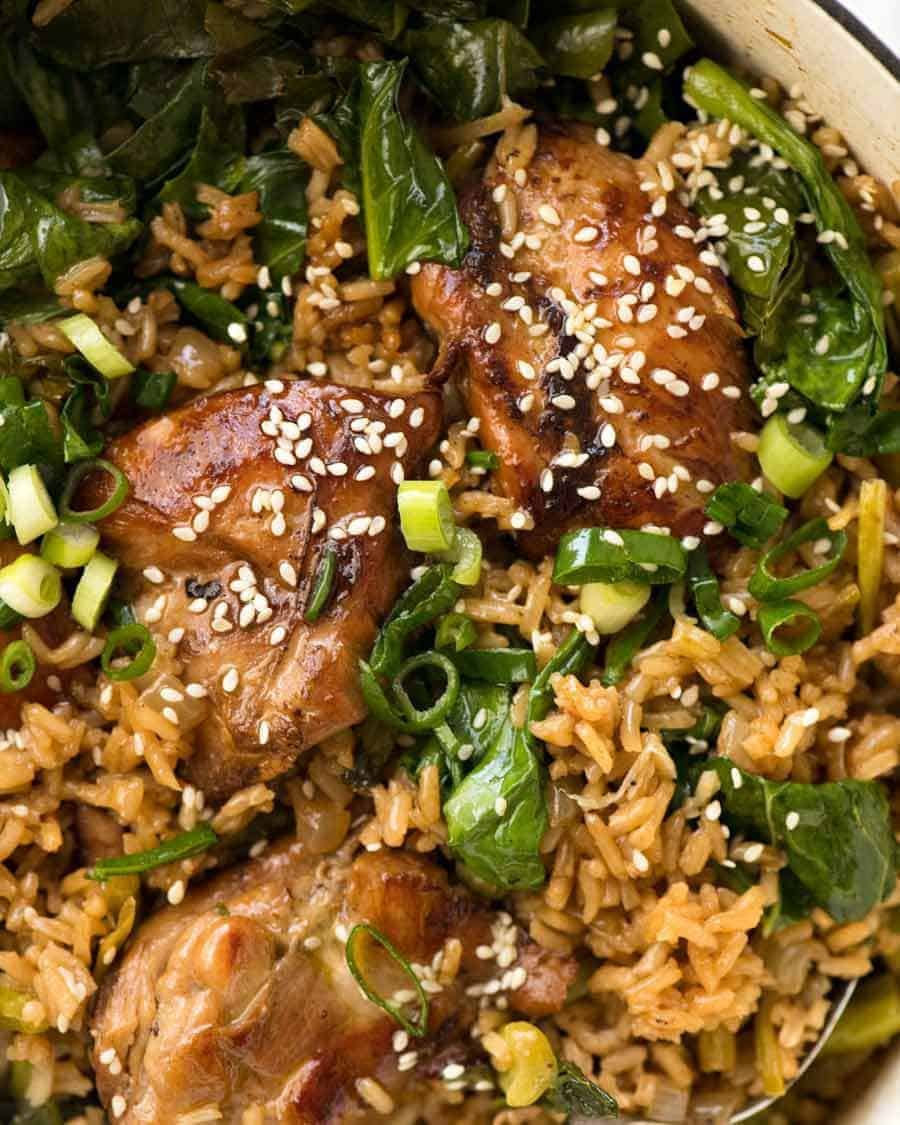 Close up of One Pot Chinese Chicken and Rice in a white pot, fresh off the stove