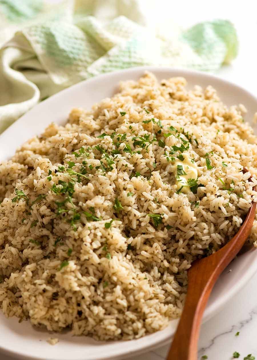 Flavoured butter rice on a plate, ready to be served