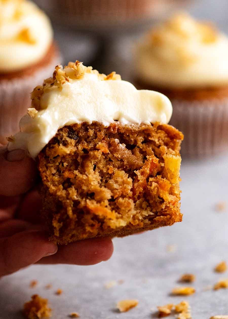 Close up showing the inside of Carrot Cake Cupcakes with Cream Cheese Frosting