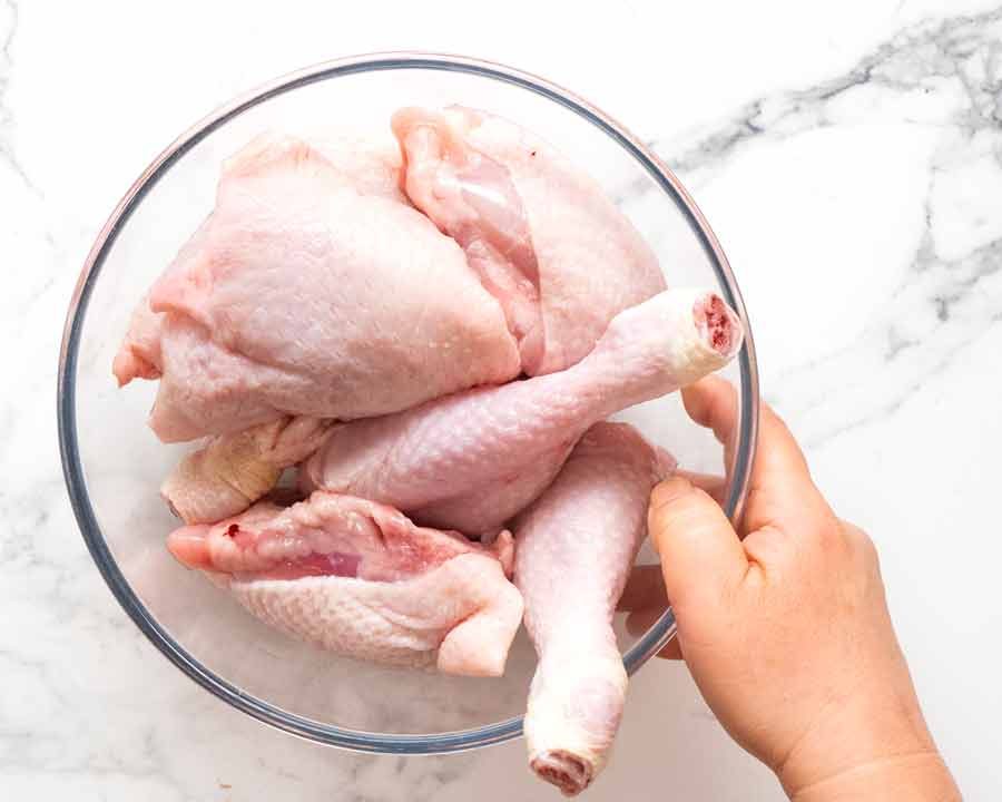 Raw chicken drumsticks and thigh cutlets for Chicken Fricass&eacute;e