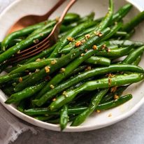 Garlic Saut&eacute;ed Green Beans on a plate ready to be served